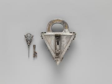 1280px-Padlock_and_key_MET_DP-13615-073